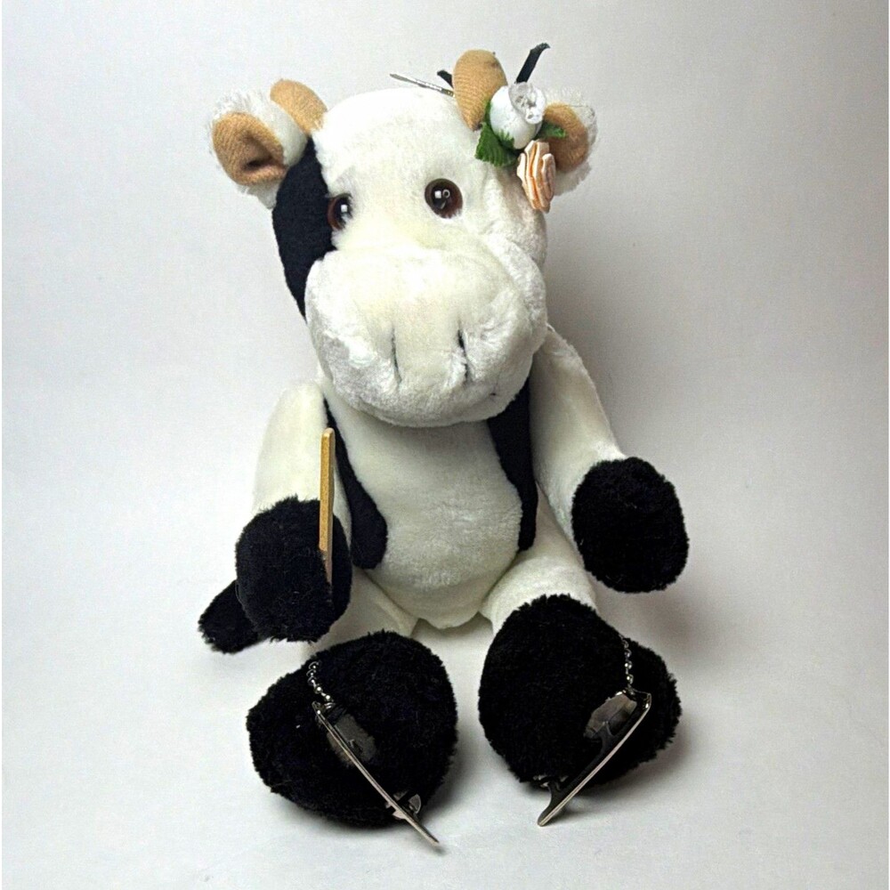 Black White Cow Plush Stuffed Animal on Ice Skates, articulated arms legs